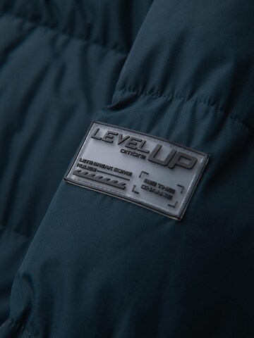 Ombre Winterjas 'Level up' in Blauw