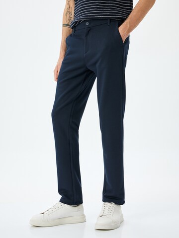 Koton Flared Broek in Blauw: voorkant