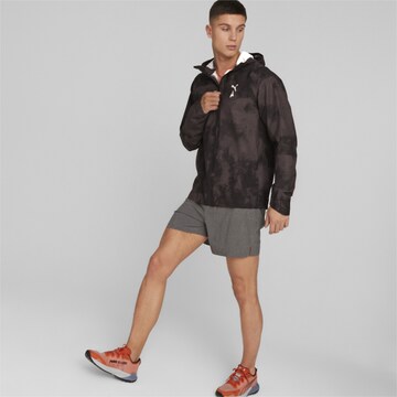 PUMA Sportjacke in Schwarz