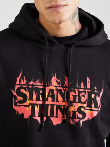 JACK & JONES Sweatshirt 'JORStranger Things' in Black