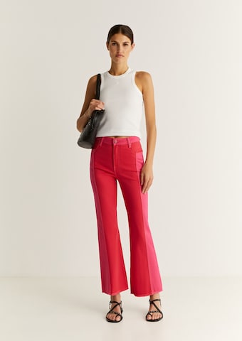 Scalpers Flared Jeans in Pink: front