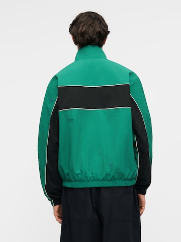 Nike Sportswear Átmeneti dzseki 'CLUB' - zöld