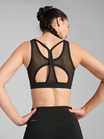 Bustier Soutien-gorge de sport '4Keeps Cloudspun' PUMA en noir