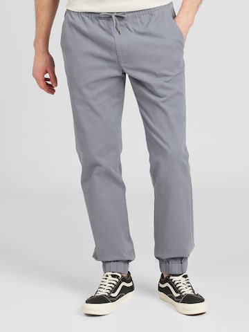 JOHN DEVIN Tapered Trousers in Blue: front