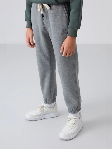 Tommy Life Broek 'TOMMY Kinder Jogginghose' in Grijs