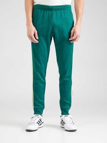 ADIDAS ORIGINALS Конический (Tapered) Штаны 'Adicolor Classics Sst' в Зеленый: спереди