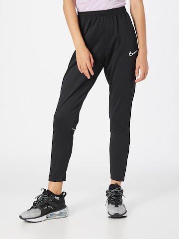 NIKE Regular Sports trousers in Black: front