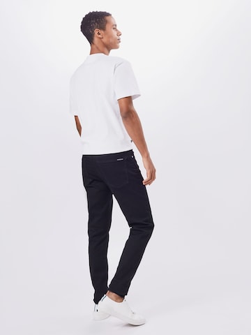 Calvin Klein Jeans - Slimfit Calças de ganga 'CKJ 058 SLIM TAPER' em preto