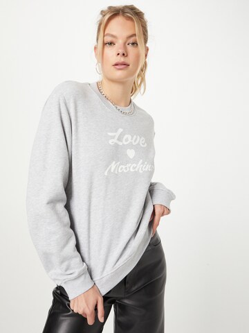 Love Moschino Sweatshirt in Grijs: voorkant