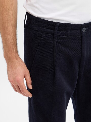DRYKORN Tapered Pleat-Front Pants 'Chasy' in Blue