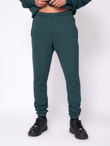 Coupe slim Pantalon de sport 'Essential Jogger' Fortex Fitness en vert