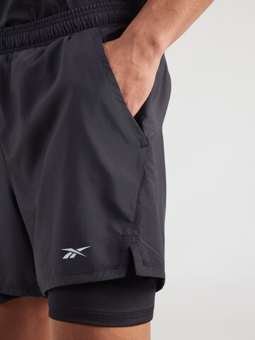 Reebok Szabványos Sportnadrágok 'ATHLETE' - fekete