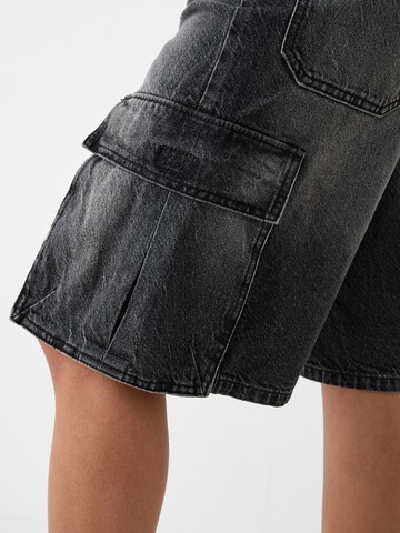 Loosefit Jeans cargo Bershka en noir
