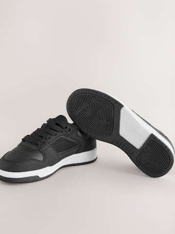 Baskets Next en noir