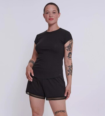 SLOGGI T-shirt 'Go' i svart