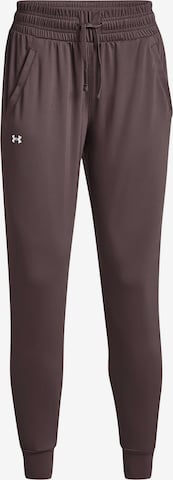 Effilé Pantalon de sport UNDER ARMOUR en marron : devant