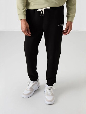 Tommy Life Trainingspak 'Aktive Sets' in Zwart