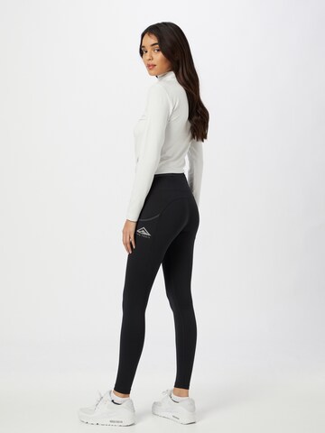 NIKE Skinny Spodnie sportowe 'Epic Luxe' w kolorze czarny