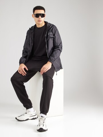 ELLESSE Between-Season Jacket 'Voleta' in Black