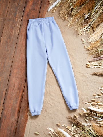 Kendall for ABOUT YOU Loose fit Pants 'Dillen' in Blue