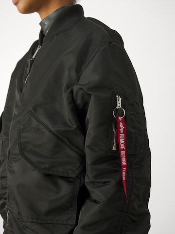 ALPHA INDUSTRIES Övergångsjacka 'CWU MA-1' i svart