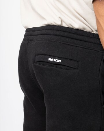 SNOCKS Tapered Jogginghose in Schwarz