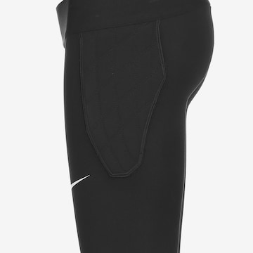 NIKE Skinny Workout Pants in Black
