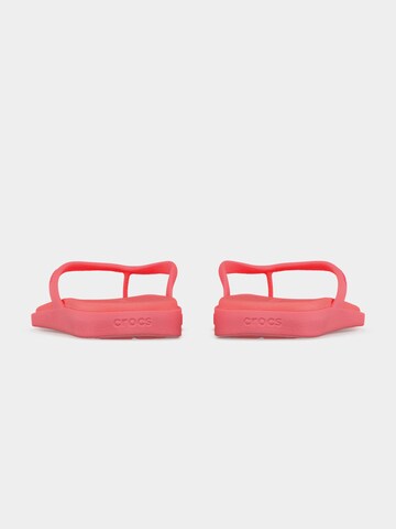 Crocs Сандали с разделител за пръстите 'Miami' в розово