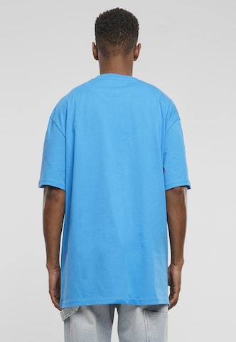 Karl Kani Shirt 'Originator' in Blauw