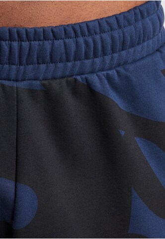 Effilé Pantalon Ecko Unlimited en noir
