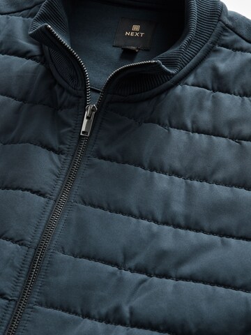 Next Tussenjas in Blauw