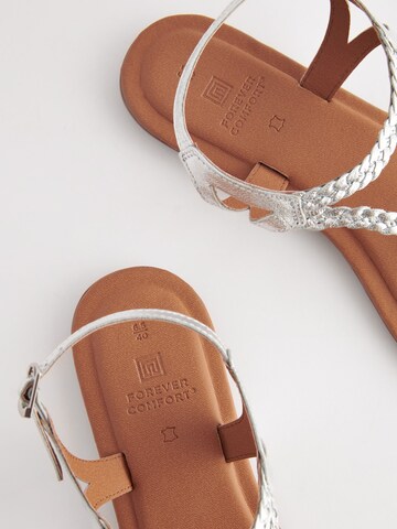 Tongs Next en argent