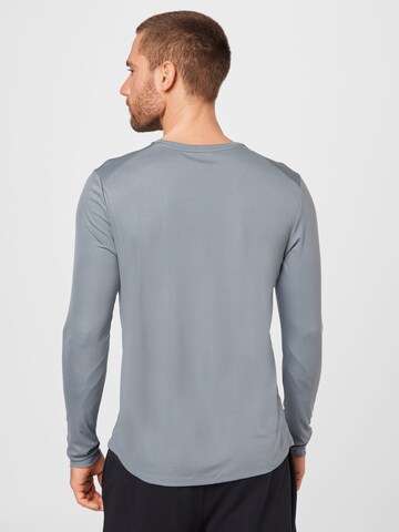 NIKE Funktionsshirt 'Miler' in Grau