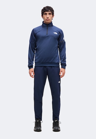 THE NORTH FACE Slimfit Športne hlače 'MOUNTAIN ATHLETICS USHBA' | modra barva