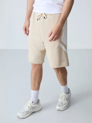 Regular Pantalon Tommy Life en mélange de couleurs