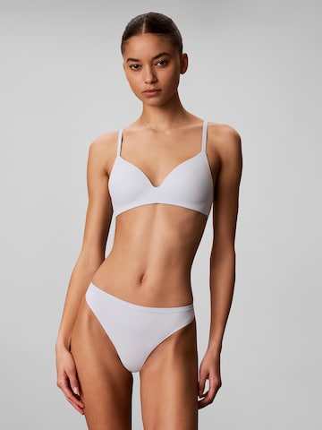 Calvin Klein Underwear Thong in Blue: front