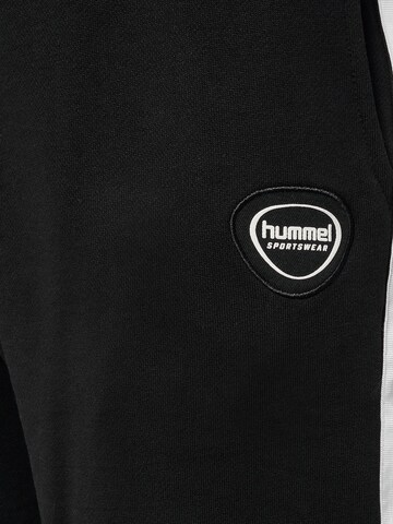 Effilé Pantalon 'LGC MARK' Hummel en noir