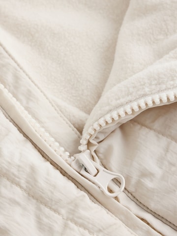 Next Overall in Beige
