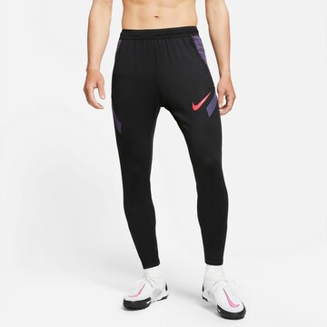 NIKE Slim fit Workout Pants 'Strike' in Black: front