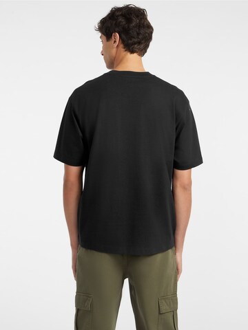 GUESS T-Shirt in Schwarz