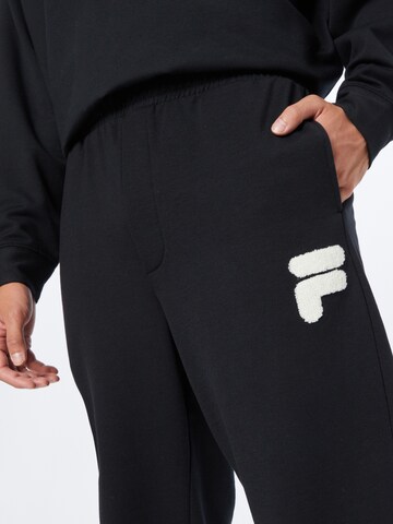 FILA Дънки Tapered Leg Панталон 'CHIASSO' в синьо