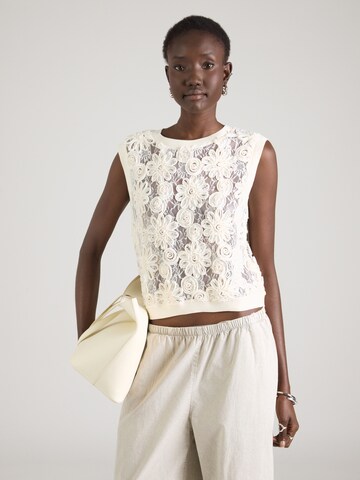 Haut monari en beige : devant