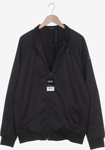 PUMA Jacket & Coat in L-XL in Black: front