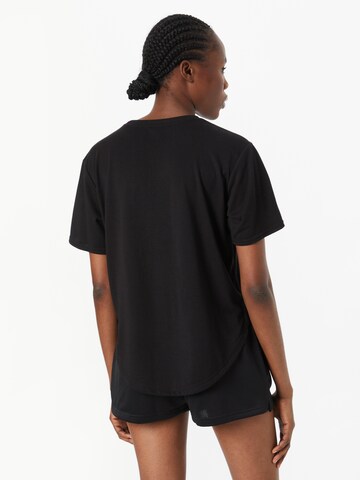 PUMA Performance Shirt 'Day in Motion' in Black