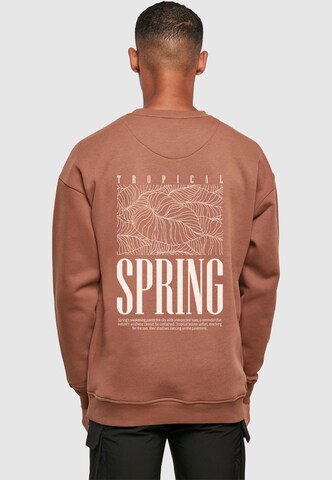 Merchcode Sweatshirt 'Tropical Spring' in Bruin: voorkant
