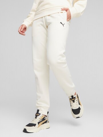 PUMA Tapered Pants in White: front