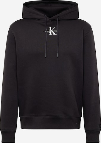 Sweat-shirt Calvin Klein Jeans en noir : devant