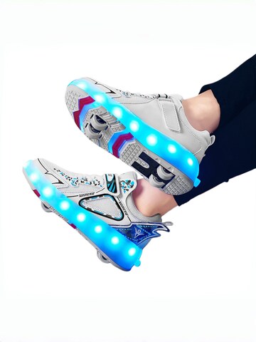 HUSKSWARE Inline and Roller Skates in White