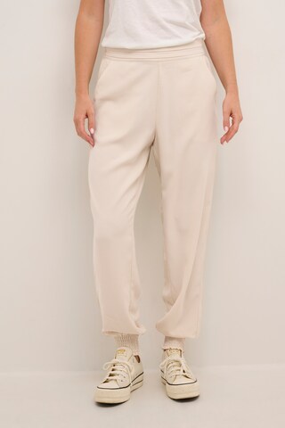 Cream Tapered Broek 'Cocamia' in Beige: voorkant