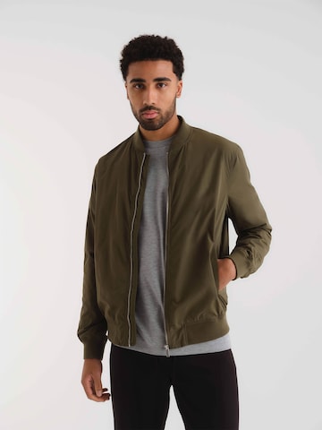 ABOUT YOU x Kevin Trapp Between-Season Jacket 'Robin' in Green: front